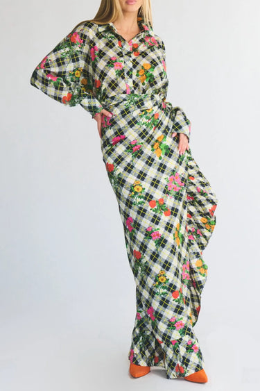 Floral and checkered button down top and ruffle power pareo skirt on a white background
