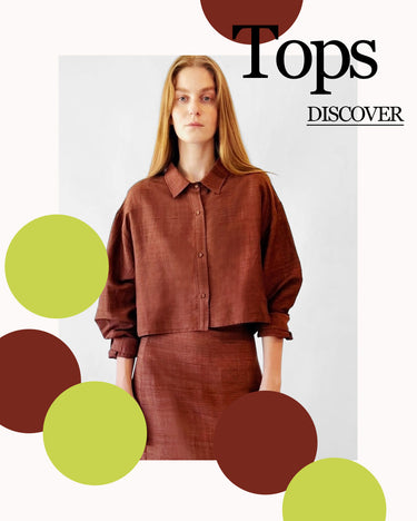 A woman modeling a rust-brown cropped button-up shirt with a matching skirt, set against a white background with graphic text and colored circles. The text reads 'Tops DISCOVER'. Click this image to go to the tops collection.